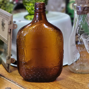 Vintage Embossed Amber Paul Jones Whiskey Bottle