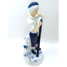 Load image into Gallery viewer, Vintage Porcelain Figurine Boy Sharpening Scythe Blue White Gold Light Academia