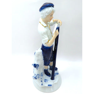 Vintage Porcelain Figurine Boy Sharpening Scythe Blue White Gold Light Academia