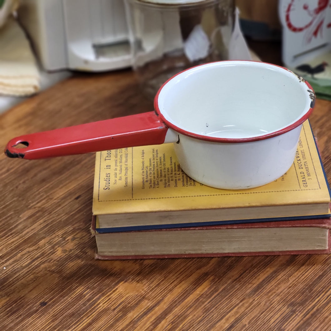 Vintage 2 cup small Enamelware saucepan with red handle and rim