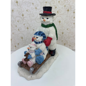 Christmas Snow Family Sledding figurine by Youngs Inc. 1996