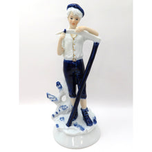 Load image into Gallery viewer, Vintage Porcelain Figurine Boy Sharpening Scythe Blue White Gold Light Academia
