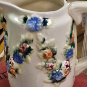 Beautiful Stoneware Pitcher with Raised Foral Garland