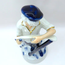 Load image into Gallery viewer, Vintage Porcelain Figurine Boy Sharpening Scythe Blue White Gold Light Academia