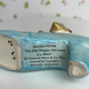 Beatrix Potter's Old Woman Who Lived in a Shoe Porcelain Figurine by Beswick England