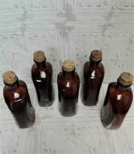 Log Cabin Amber Bottles