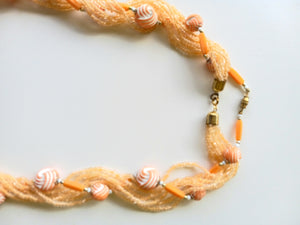 Vintage Coral Colored Twist 7 Strand Necklace 28" in Length