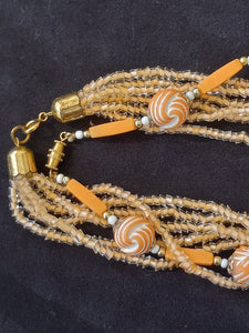 Vintage Coral Colored Twist 7 Strand Necklace 28" in Length