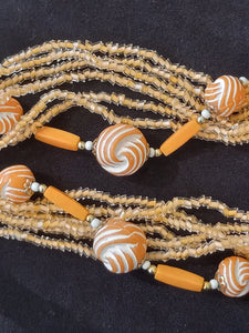 Vintage Coral Colored Twist 7 Strand Necklace 28" in Length
