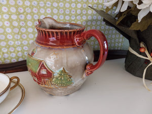 Winter Scene Pitcher with Embossed Log Cabin and Pine Trees