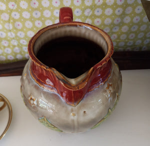 Winter Scene Pitcher with Embossed Log Cabin and Pine Trees