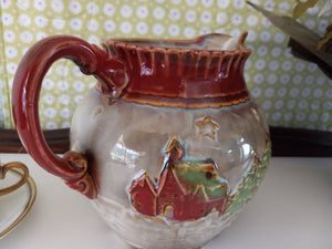 Winter Scene Pitcher with Embossed Log Cabin and Pine Trees