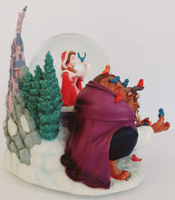 Load image into Gallery viewer, Disney&#39;s Beauty and the Beast Musical Snow Globe with the Beast Feeding Birds