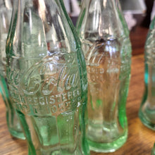Load image into Gallery viewer, Vintage 50/60&#39; 6oz Coke bottles from 6 different Bottling Locations
